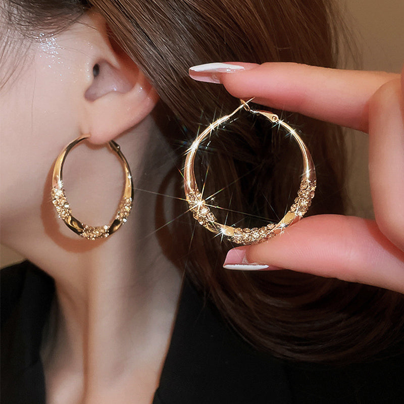 Luxury Twisted Rhinestone Earrings – Elegant, Sparkling & Timeless