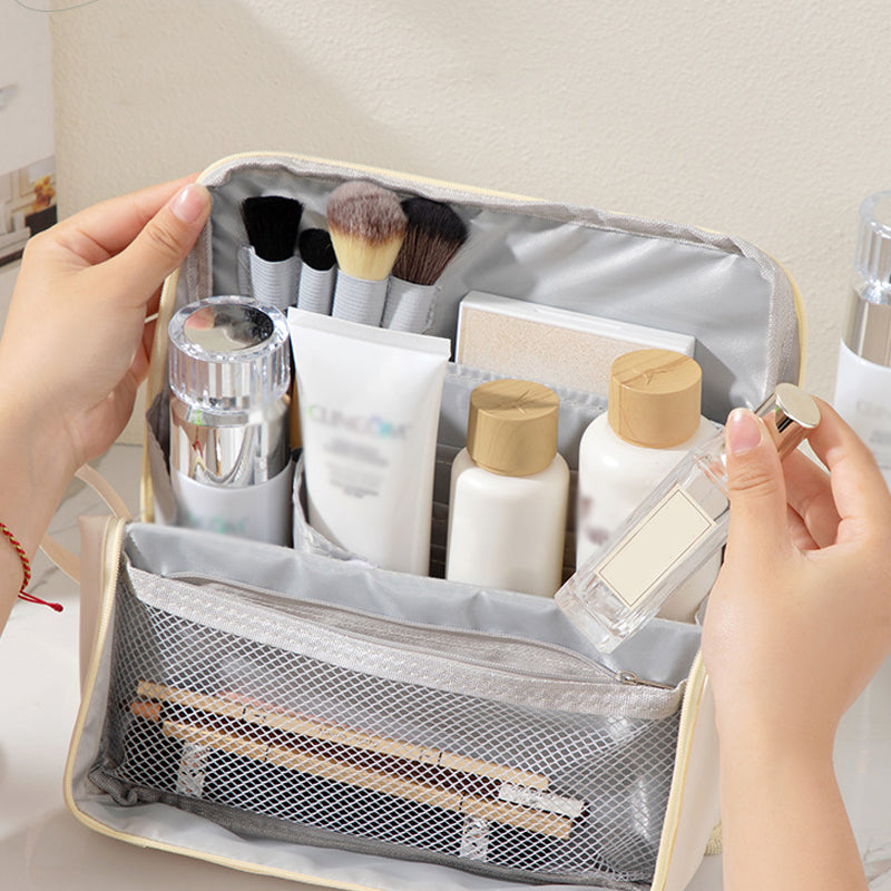 🔥Hot Sale🔥Stylish Handheld Partitioned Cosmetic Bag👜